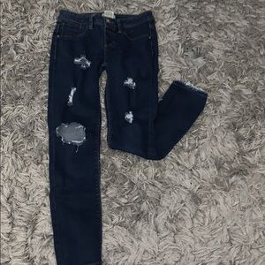 navy blue ripped jeans